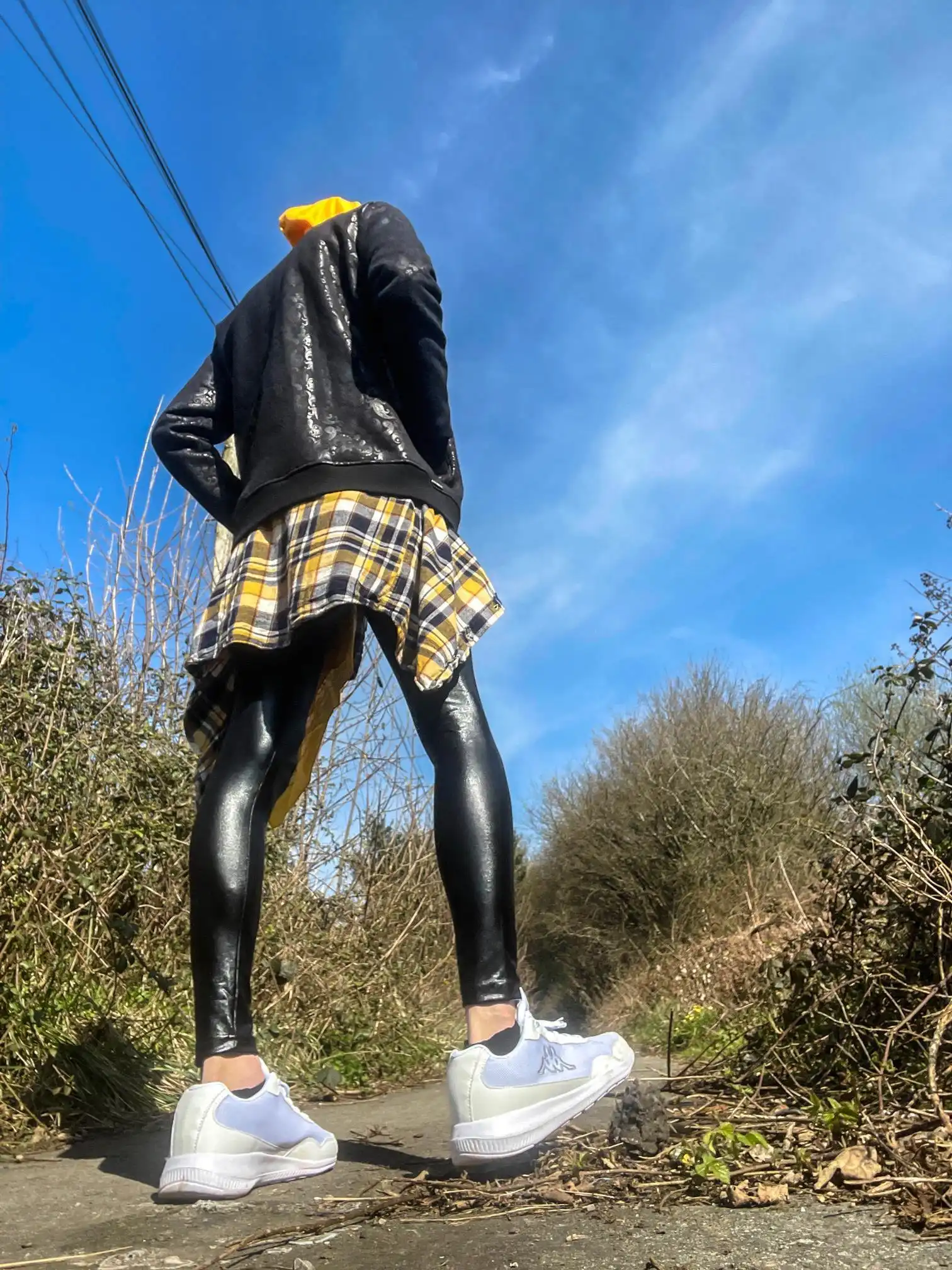 Yellow Hoodie, Black Leather Leggings and Denim Converse Hi-Tops